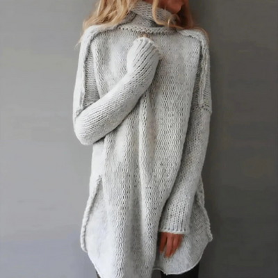 GSTAAD CABLE KNIT SWEATER